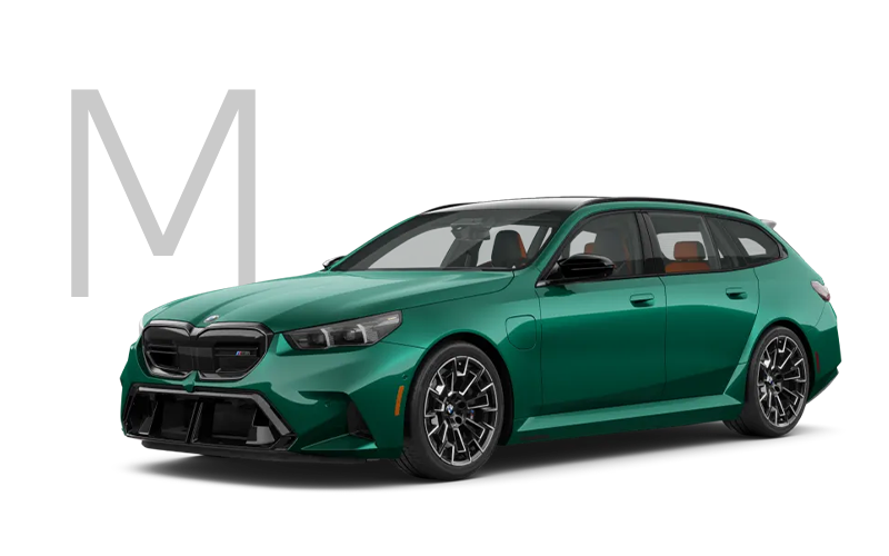The new BMW M5 Touring in green with M logo. | BMW of Morristown in Morristown NJ