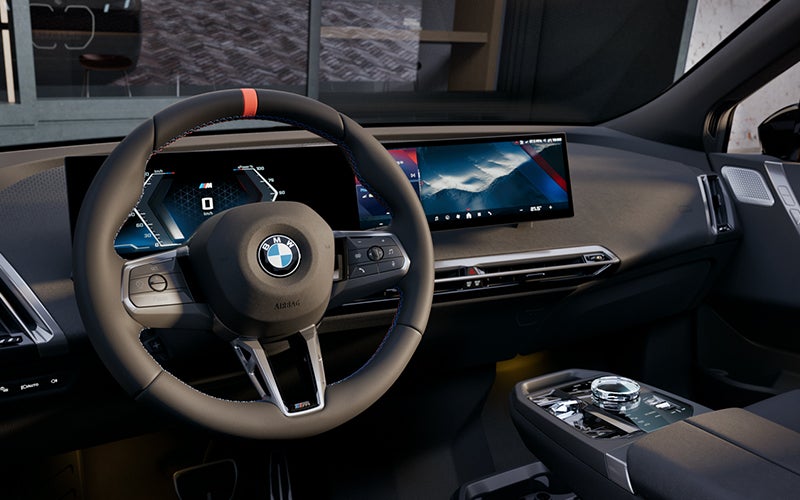 Interior steering wheel and dashboard of the BMW iX M70. | BMW of Morristown in Morristown NJ