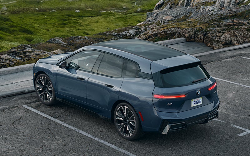 The BMW iX parked in a parking spot. | BMW of Morristown in Morristown NJ