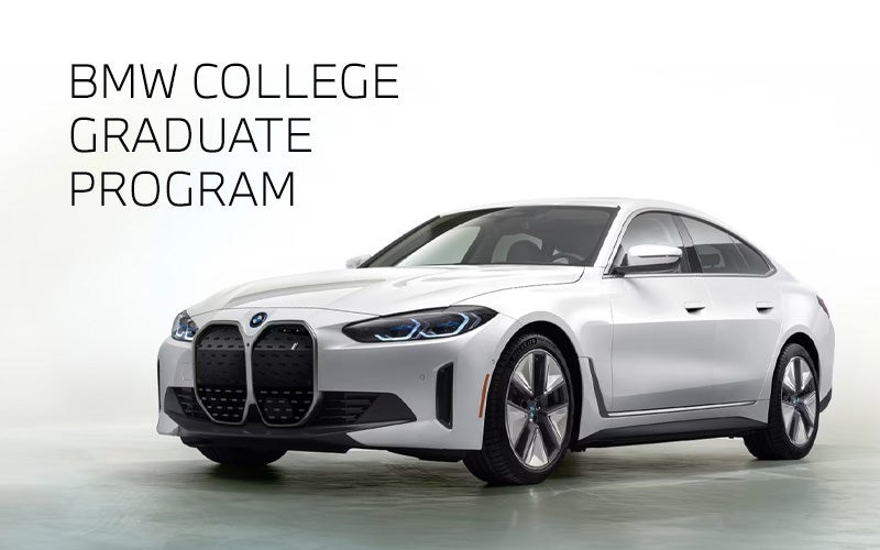 White BMW i4 parked. BMW College Graduate Program. | BMW of Morristown in Morristown NJ