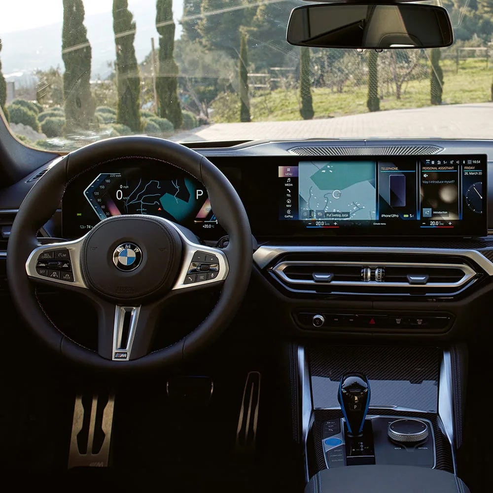 A driver's eye view of steering wheel and controls of the BMW i4 | BMW of Morristown in Morristown NJ